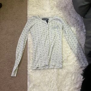 A vintage brand PINK shirt with rhinestones